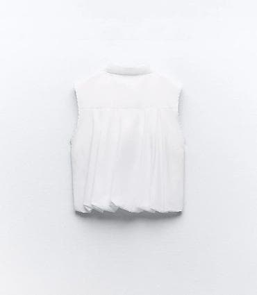 Ağ rəngli, qolsuz köynək/bluz. - Brend: ZARA (etiketdə görünür). - — 7