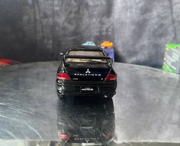 maşın modeli: Коллекционная модель Mitsubishi Lancer Evolution VII black 2002 — 9