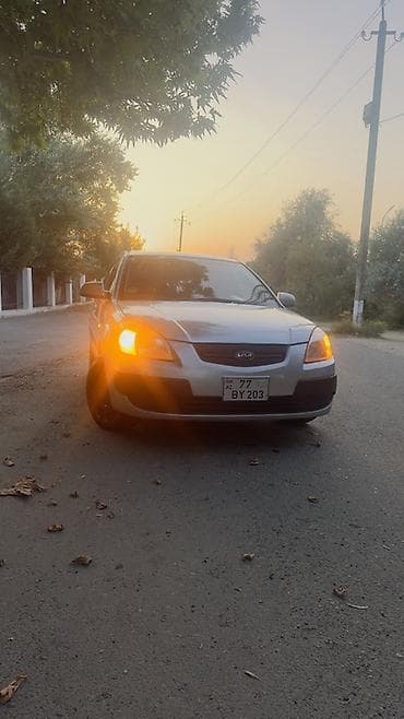 авто volkswagen: Kia Rio: 1.4 л | 2005 г. Хэтчбэк — 1