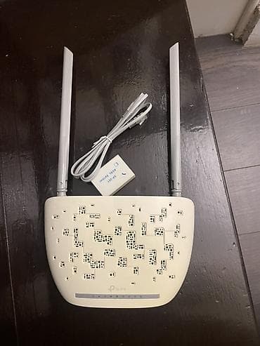 sntv internet: TP-Link simsiz router Xüsusiyyətlər: - İki güclü xarici antenna – ev — 1
