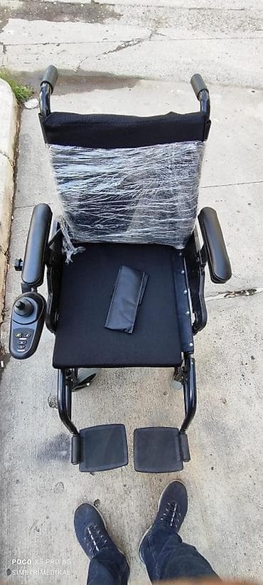 Elektrik təkərli kreslo - İdarəetmə: Sol tərəfdə joystick paneli