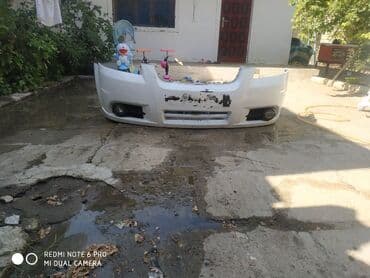 banper: Ön, Chevrolet Aveo, 2011 il, ABŞ, Ünvandan götürmə — 2