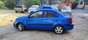 3D panellər: Kia Rio sedan, mavi rəng - Kuzov: 4 qapılı sedan, orijinal KIA loqolu — 4