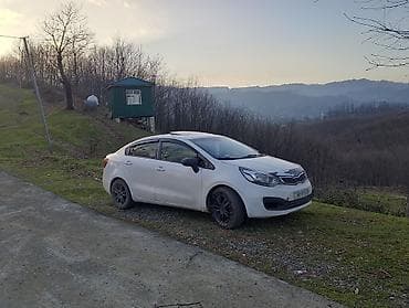 masin hunday: Kia Rio: 1.4 l | 2012 il Sedan — 1