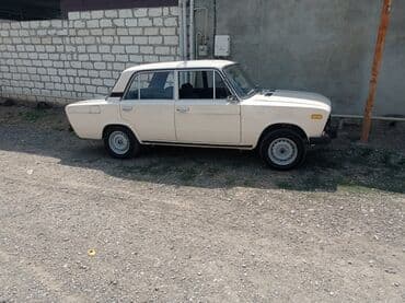 ваза напольная стеклянная высокая без узора: Model: VAZ 2106 sedan Xüsusiyyətlər: - Rəng: ağ, 4 qapı - Mexaniki — 4