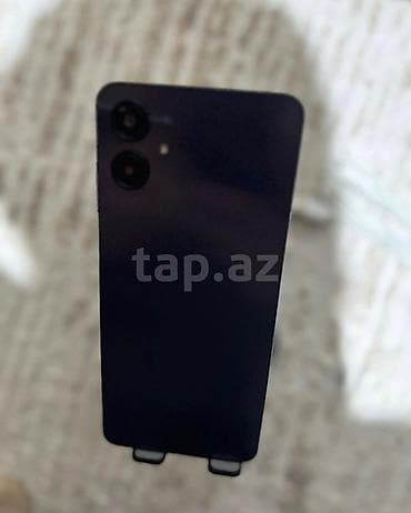 Мобильные телефоны и аксессуары: Samsung Galaxy A06, 128 ГБ, цвет - Серебристый, Отпечаток пальца, Face ID — 3
