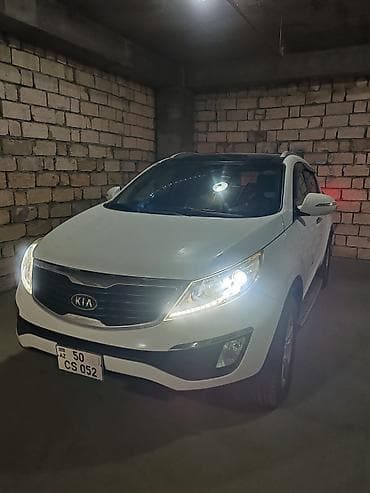 Kia Sportage: 2 l | 2013 il