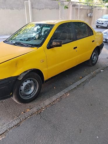 turbo az qaz 21: Model: Iran Khodro Samand (sedan) Kuzov: 4 qapı, sarı/qara rəng sxemi — 6
