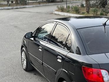 опель зафира а: Kia Rio: 1.4 л | 2011 г. Седан — 5