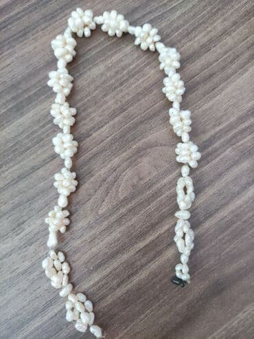 tək qaş: Boyunbağı — 2