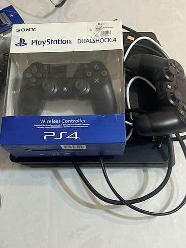 Ps 4 slim 1tb yaddaş 1 illik oyun paketi var icində real adama