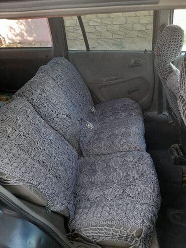 tap az traktor t40: Opel Astra Caravan – universal kuzovlu, qara rəngdə. Əsas — 5