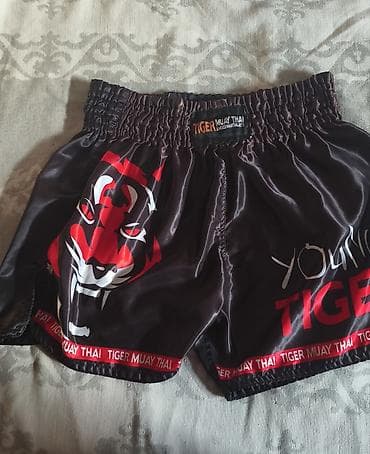 stringer alt geyimi: MMA/Muay Thai ekipmanı dəsti 1) Tiger Muay Thai şortu - Rəng: qara — 1