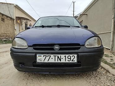 teker 14: Opel Corsa B, 5 qapı, tünd bənövşəyi rəngli hetçbek. Xüsusiyyətlər: - — 6