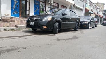 фольксваген тигуан 2 0: Kia Rio: 1.4 л | 2010 г. Седан — 4