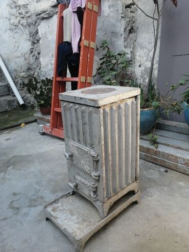 kamin od stiropora: Döküm soba – odun/kömürlə işləyən - Material: tam metal/döküm korpus — 1