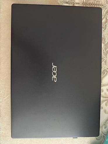 acer liquid e600: Acer noutbuk – şık mat qara korpus, yüngül və portativ dizayn — 1