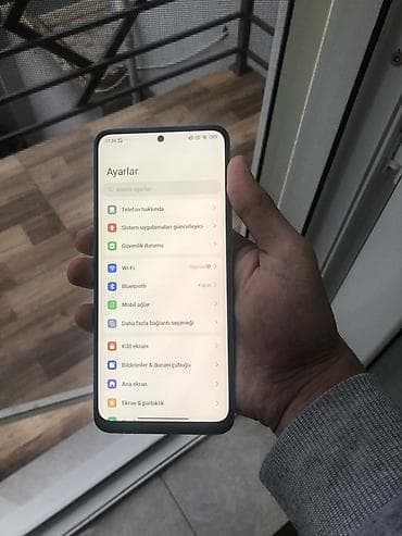 islenmis telefonlar kreditle satisi: Xiaomi 12, 128 GB, rəng - Mavi, 
 Barmaq izi, Face ID — 2