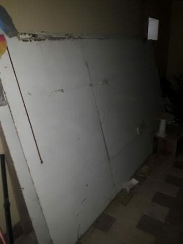 Ortada kecid qapisi olan hundur 2.90 eni 3.40 kecid qapisi 2m 90 sm