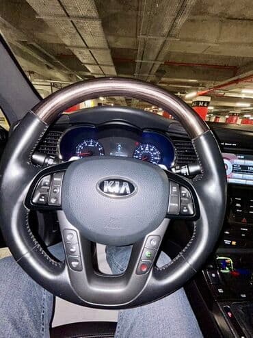 xrom diski: Kia Optima – qara rəng, sedan kuzov. Şəhərdaxili və magistral yollarda — 11