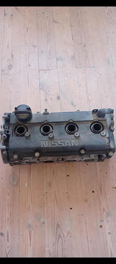Аксессуары и тюнинг: Nissan avtomobilləri üçün silindr başlığı. Bu metal hissə daxili yanma — 3