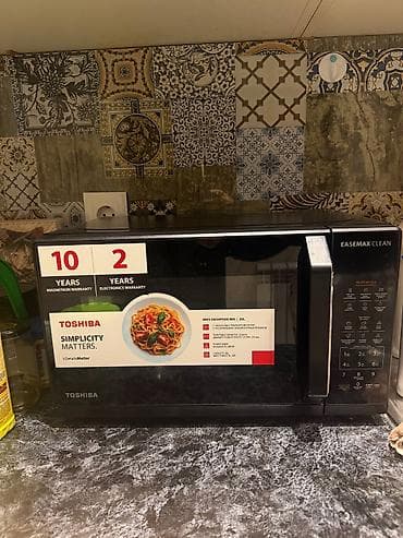 qaz sobasi satisi: Mikrodalğalı soba Toshiba, Ayrıca dayanan, Mikrodalğalar ilə, rəng - Qara — 1