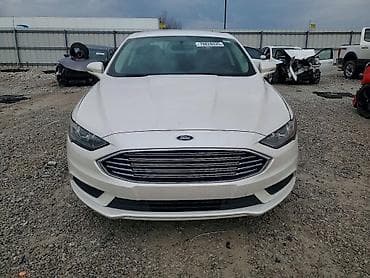 şevralit avtomobil: Ford Fusion sedan Xüsusiyyətlər: - Kuzov: 4 qapılı sedan, ağ rəng - — 1