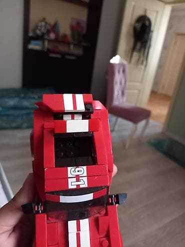 maraqli oyuncaqlar: LEGO tərzində yığılan Porsche yarış avtomobili modeli. Oyuncaq qara və — 7
