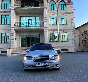 235 70 16: Mercedes-Benz sedan (W202 C-sinfi) - Kuzov: 4 qapılı sedan, gümüşü — 2