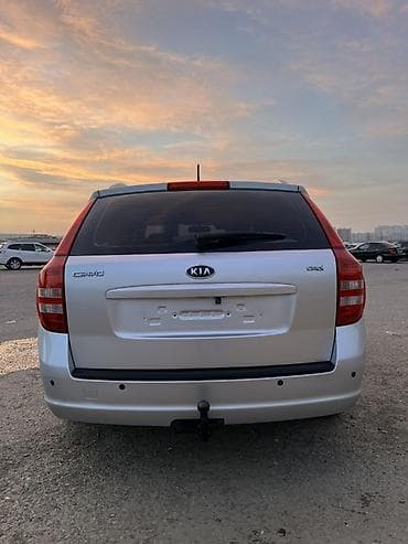 daewoo gentra 2020: Kia Cee’d SW (universal) – gümüşü rəngdə, şəhər və ailə istifadəsi — 6