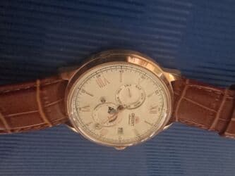 kredite qizil almaq: İşlənmiş, Qol saatı, Orient, rəng - Qızılı — 3