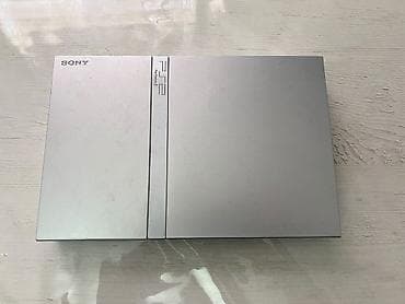 Sony PlayStation 2 (PS2) Slim – gümüş rəng Xüsusiyyətlər: - Model lalafo.az -da Sony PlayStation 2 (PS2) Slim – gümüş rəng Xüsusiyyətlər: - Model