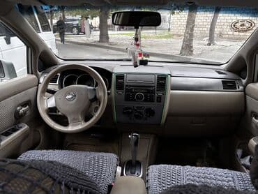 mersedes disk r15: Nissan Tiida: 1.6 l | 2006 il Sedan — 12