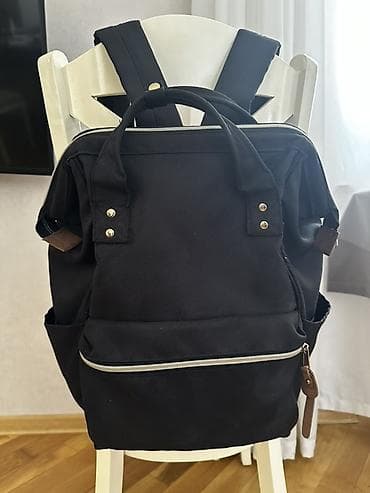 bel çanta: Qara çoxfunksiyalı bel çantası. Ölçülər: - Hündürlük: 41 sm (16.14") — 2