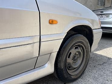 r16 disk 4 bolt: VAZ 2115 avtomobili, gümüşü rəngdə sedan kuzovlu modeldir. Şəkillərdə — 5