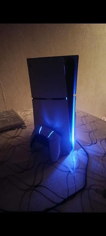 1155 plata: PlayStation 5 konsolu və DualSense idarəetmə pultu - Model: Sony — 1