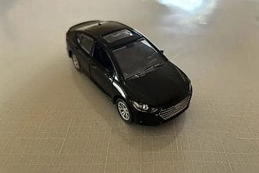 İdman və istirahət: Qara rəngli metal oyuncaq maşın modeli - Marka/model üslubu: sedan — 1