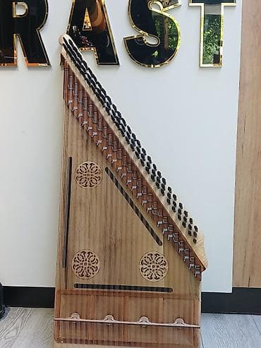 akustik gitara simi: Kanon musiqi aləti Kanon, Qanun Kanon musiqi aləti Üzerinde — 7