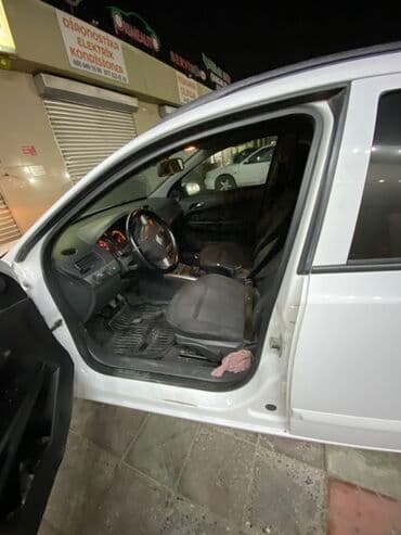 sürət qutusu yağı: Opel Astra: 1.3 l | 2007 il 458055 km Universal — 5