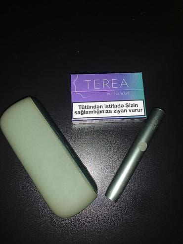 IQOS ILUMA (yaşıl rəng) tütün qızdırma cihazı və TEREA Purple Wave