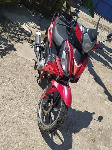 disk r16 type 0 per page 40: Model: Moped tipli motosiklet (underbone), qırmızı-qara rəng Mühərrik — 1