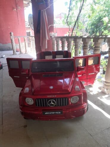 masin ucun xor xor: Mercedes G-Class (AMG üslubunda), qırmızı rəng. Xüsusiyyətlər: - — 2