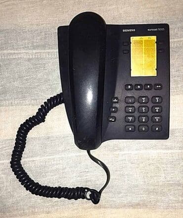 ən yaxşı epilyator: Stasionar telefon Simli — 1