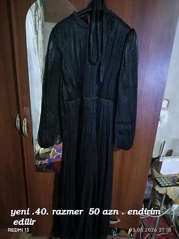 Qara rəngli, uzun pliseli don. - Ölçü: 40 - Material: nazik, parıltılı