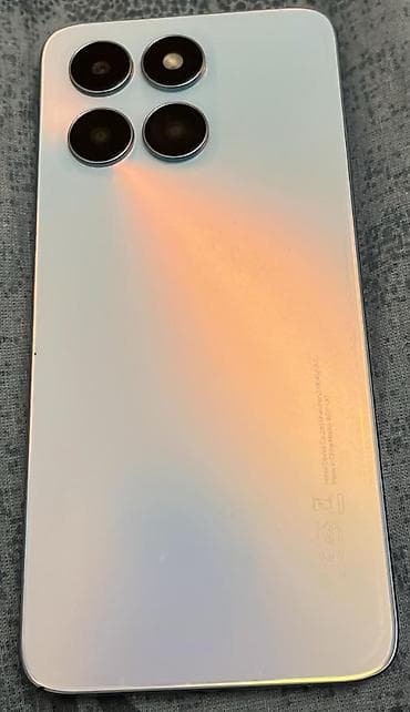 ayfon gence kiredit: Model:Honor X6A Yaddaş:128GB Ram:4 Qoruyucu Ekran və Adapturda — 2