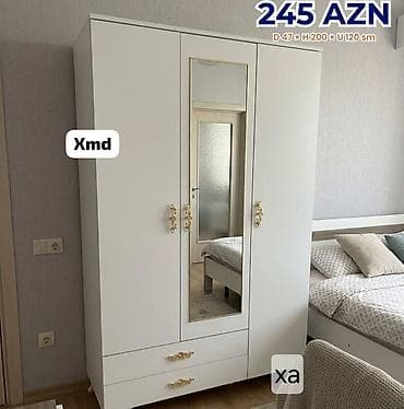 bed: Ağ rəngli 3 qapılı şkaf, üzərində güzgü paneli. Qızılı rəngli — 1