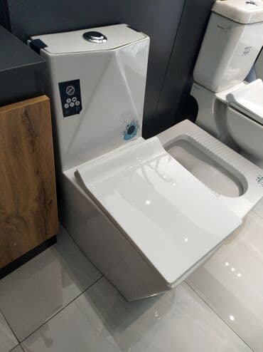 unitaz yerden: Ağ rəngli, keramikadan hazırlanmış unitaz. Dizaynı müasir və — 1