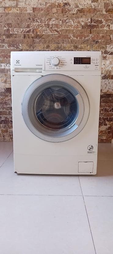 mp3 fm modulator: Electrolux paltaryuyan maşın – TimeManager seriyası, ön yükləməli — 1