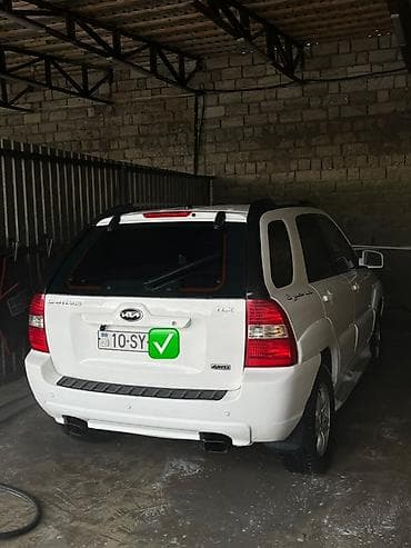 e39 guzgu: Eve işe surulen maşındır cicey kimi bacilib seliqelidi Kia Sportage — 10