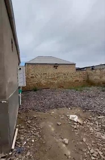 Продажа домов: Satılır: həyət evi - Ümumi təsvir: Yüksək daş hasarla əhatələnmiş — 2